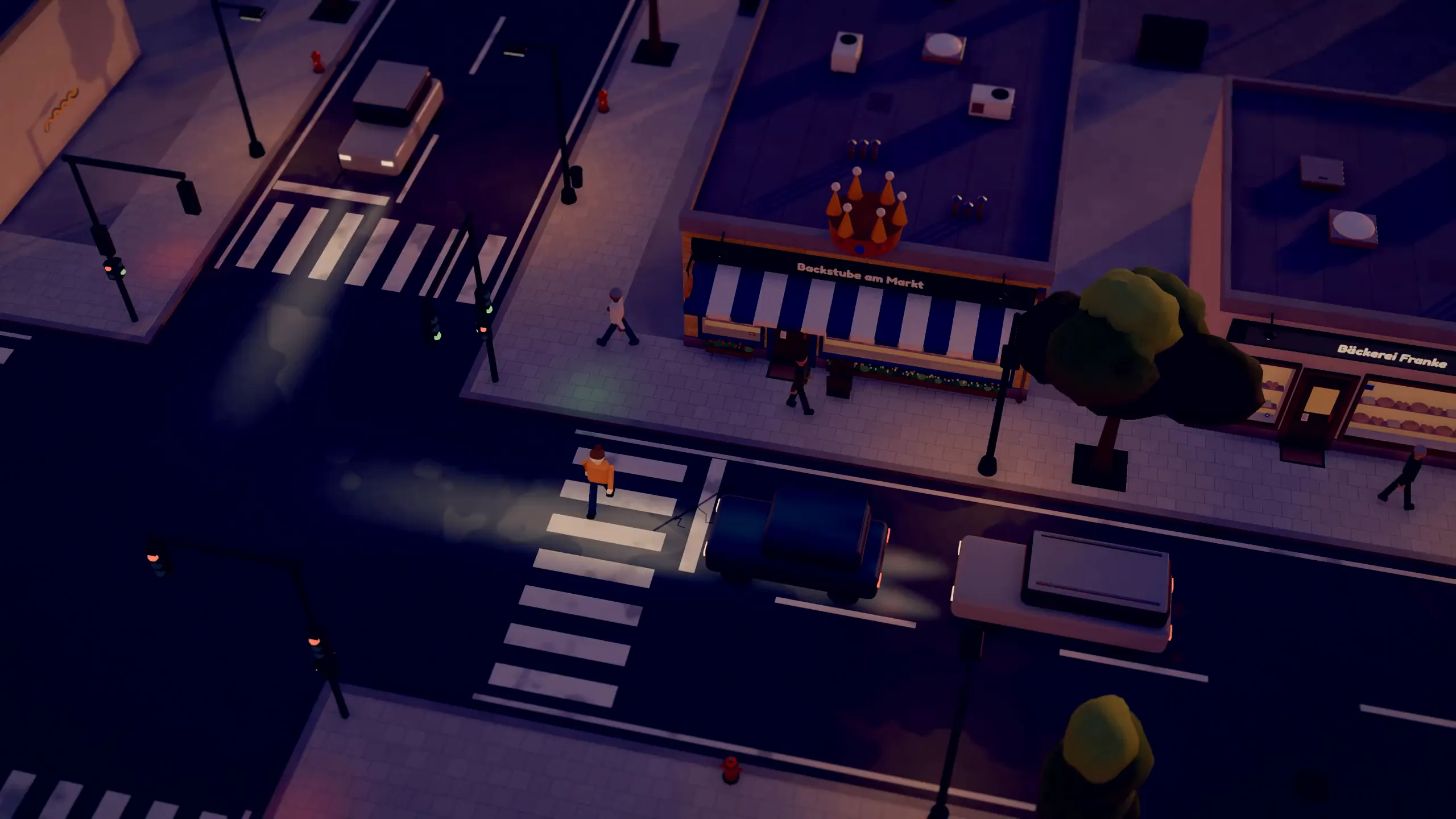 Street by the market square in the evening: lit shops, cars with headlights and passers-by
